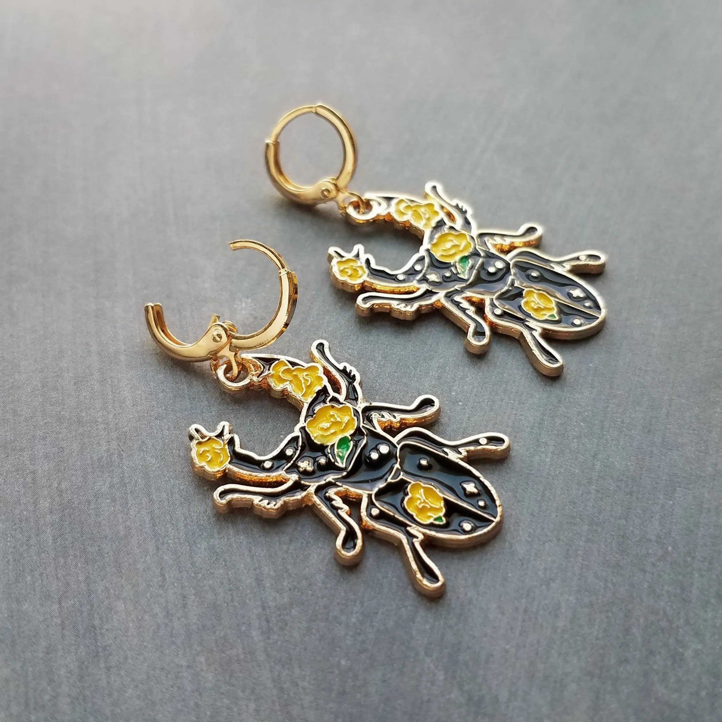 Black Beetle Earrings, stag horn beetle, beetle jewelry, gold huggie hoop, yellow flowers on beetle, insect jewelry, black enamel bug