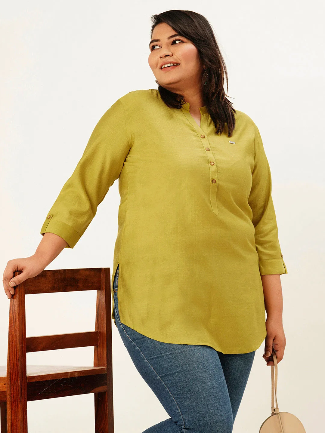 Exclusive Mandarin Collar Rayon Solid Mustard Straight Tunic For Women ZOLA