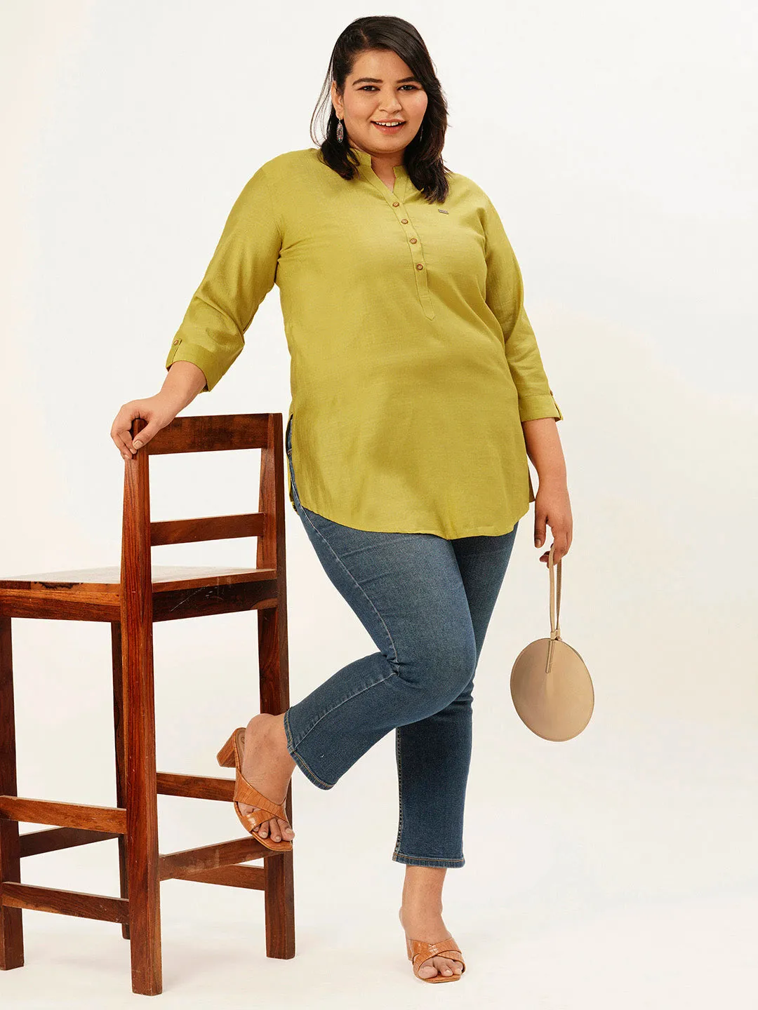 Exclusive Mandarin Collar Rayon Solid Mustard Straight Tunic For Women ZOLA