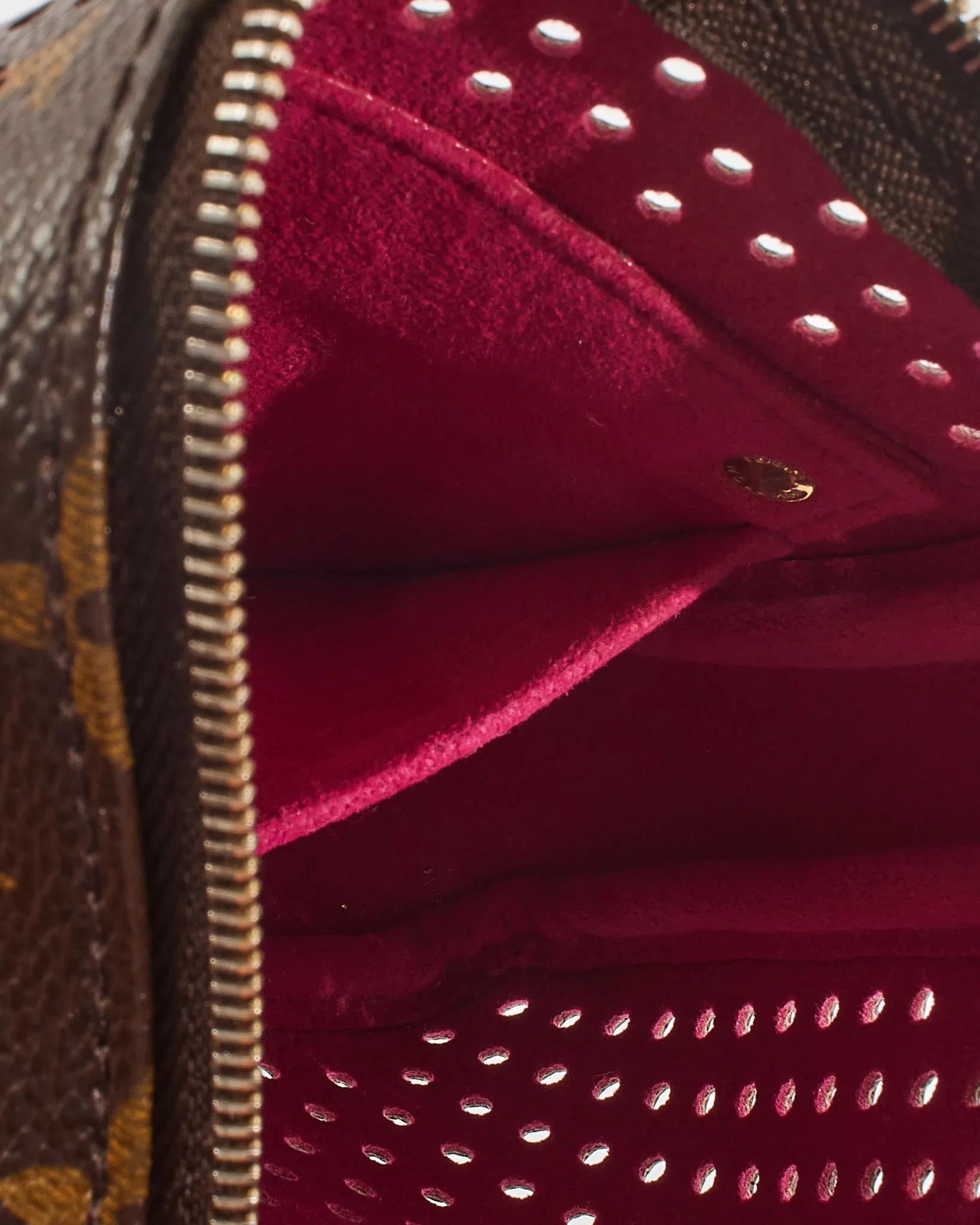 Louis Vuitton Fuchsia Monogram Perforated Pochette Accessories Bag