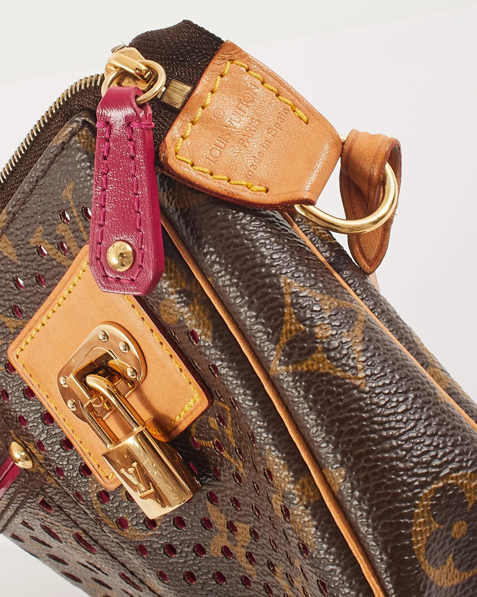 Louis Vuitton Fuchsia Monogram Perforated Pochette Accessories Bag