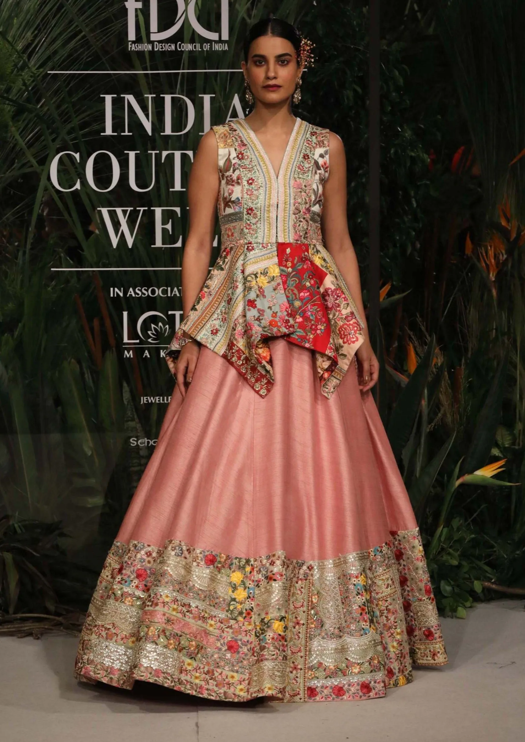 Pink patchwork lehenga with peplum top